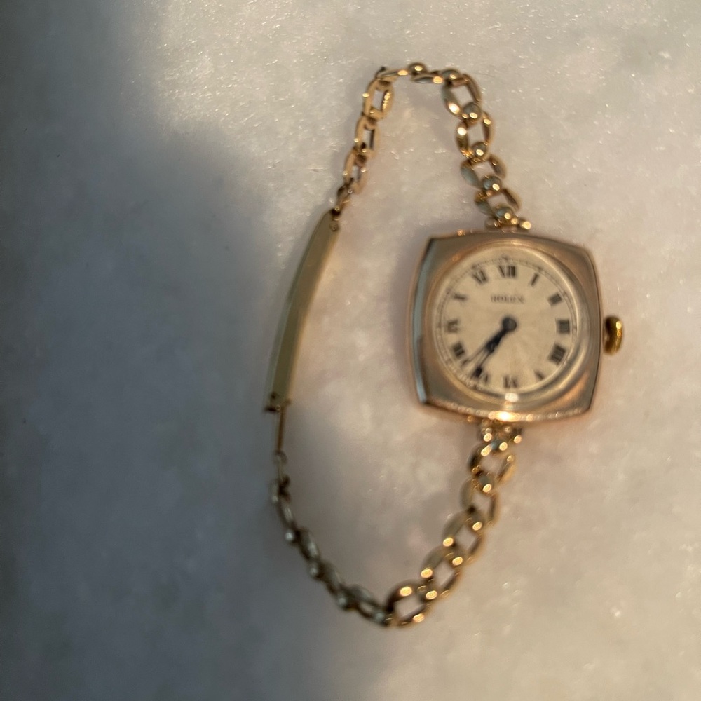 Rolex Women's Gold Watch with Cream Dial